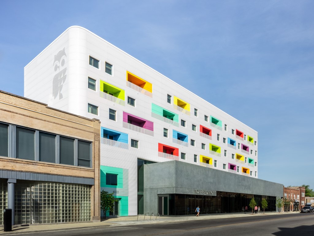 Independence Library affordable housing building's modern facade with colorful balconies